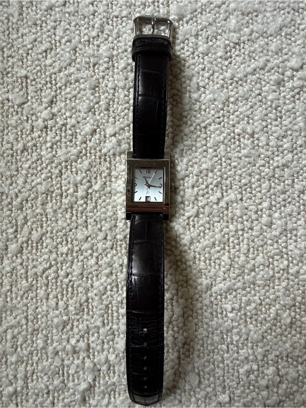 Fossil women’s watch. Silver face with new black croc leather strap.